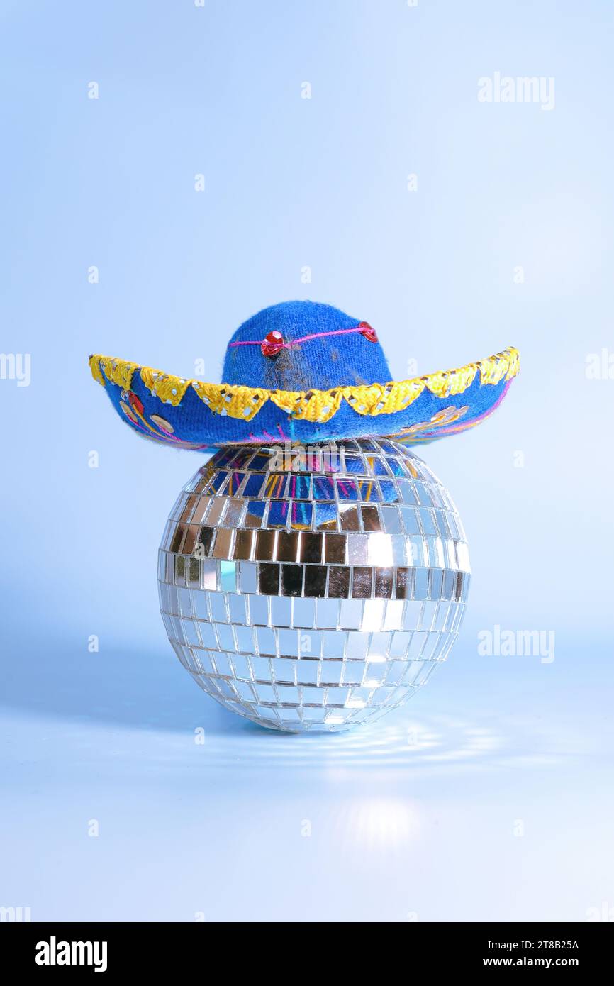 Dancing With Mexican Heritage A Silver Disco Ball In A Sombrero Hat Dancing With Mexican Heritage A Silver Disco Ball In A Sombrero Hat