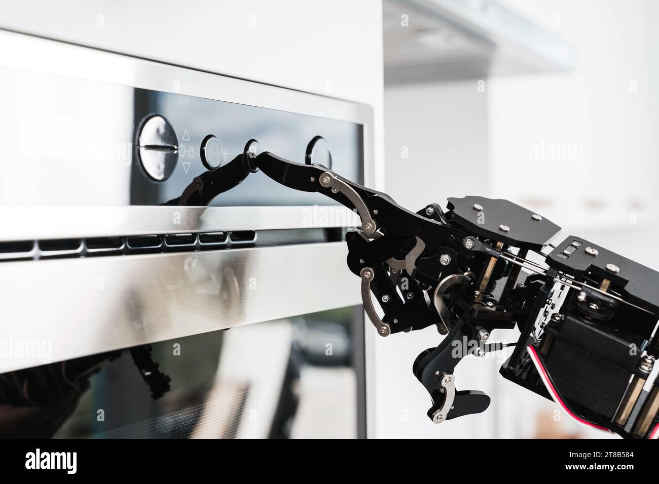 Real robot's hand and microwave oven. Concept of robotic process automation Stock Photo Alamy