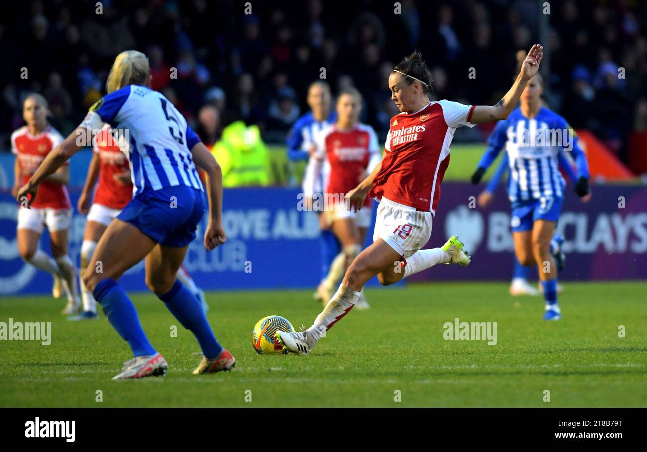 Crawley UK 19th November 2023 - Caitlin Foord of Arsenal shoots and scores their second goal  during the Barclays  Women's Super League football match between Brighton & Hove Albion and Arsenal at The Broadfield Stadium in Crawley : Credit Simon Dack /TPI/ Alamy Live News Stock Photo