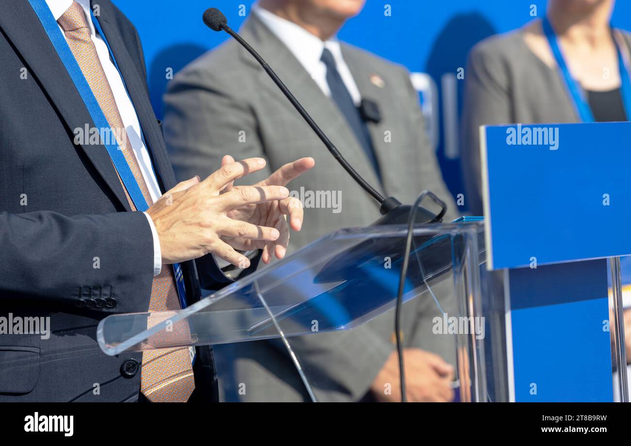 Speaker at opening ceremony, business event, public or political event. Public speaking concept. Stock Photo