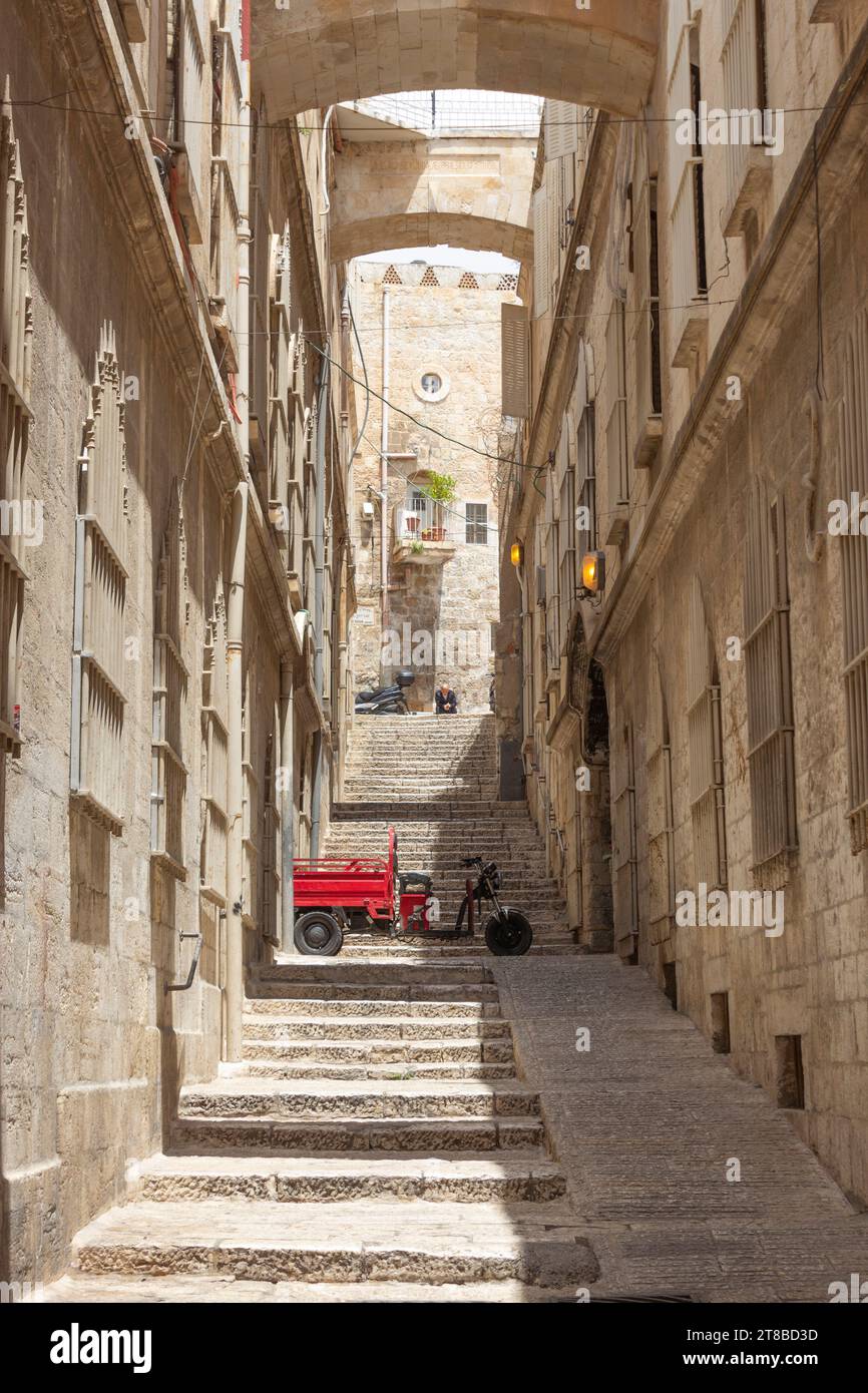 The narrow alley called Adabat el-Rahbat, or The Nuns Ascent, just off the Via Dolorosa, Old City of Jerusalem, Israel. Stock Photo