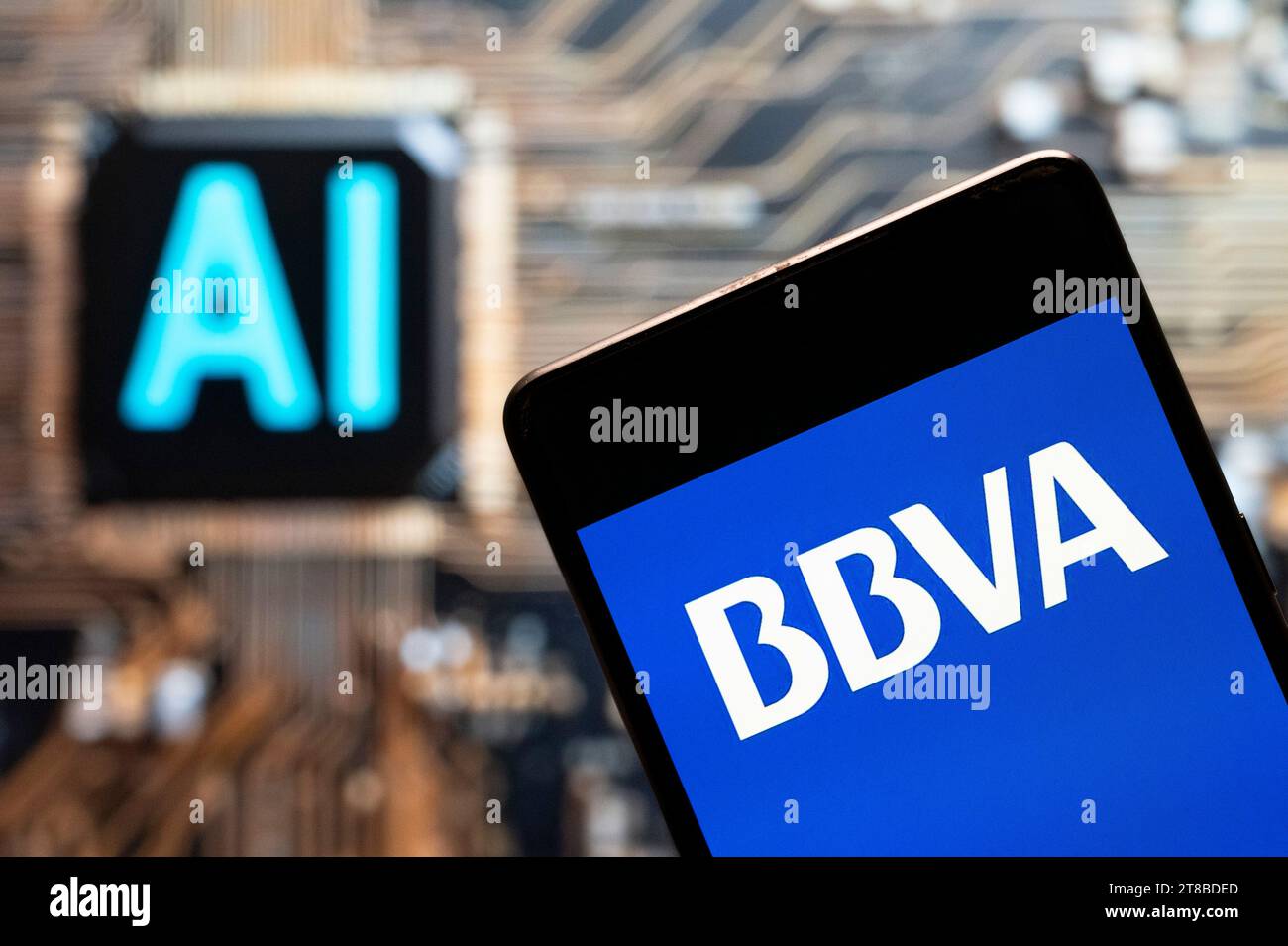 China. 03rd Nov, 2023. In this photo illustration, the Spanish multinational Banco Bilbao Vizcaya Argentaria SA (BBVA) logo seen displayed on a smartphone with an Artificial intelligence (AI) chip and symbol in the background. (Photo by Budrul Chukrut/SOPA Images/Sipa USA) *** Strictly for editorial news purposes only *** Credit: Sipa USA/Alamy Live News Stock Photo