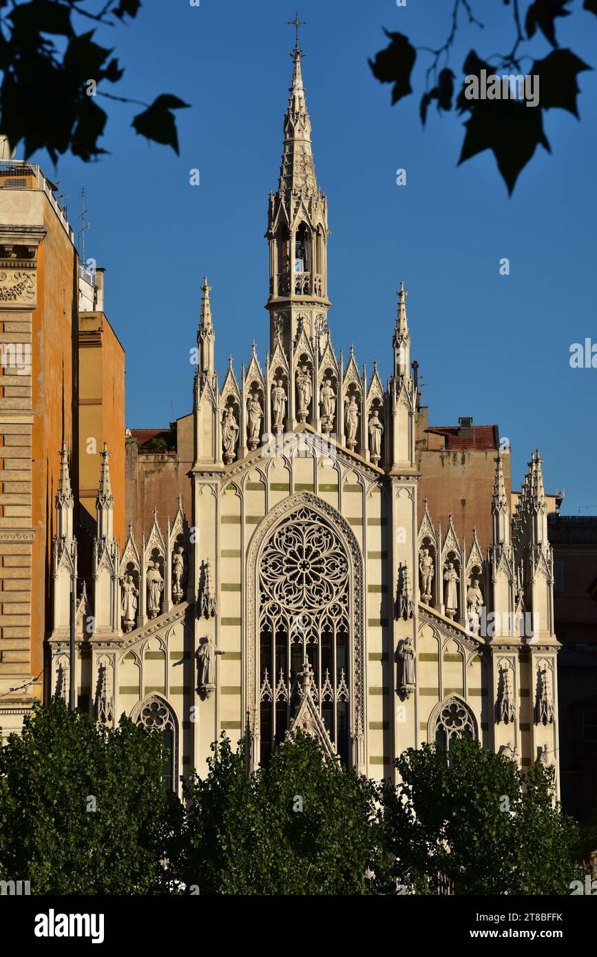 The neo-gothic exterior of Chiesa Sacro Cuore del Suffragio highlighted by early morning light, Prati, Rome, Italy, Europe. Stock Photo