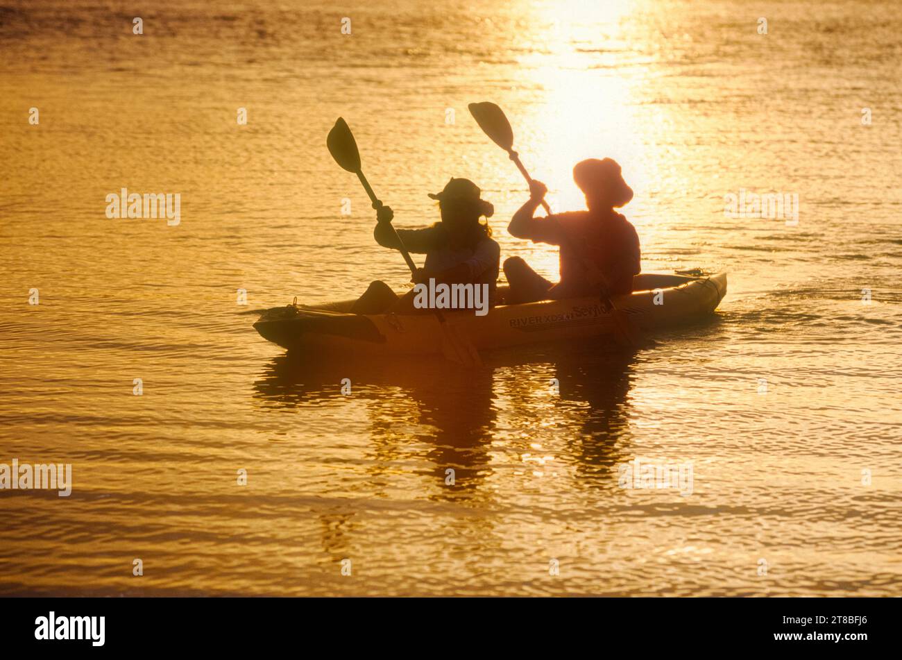 Kayaking Lake Mohave at sunset, Colorado River, Arizona Stock Photo