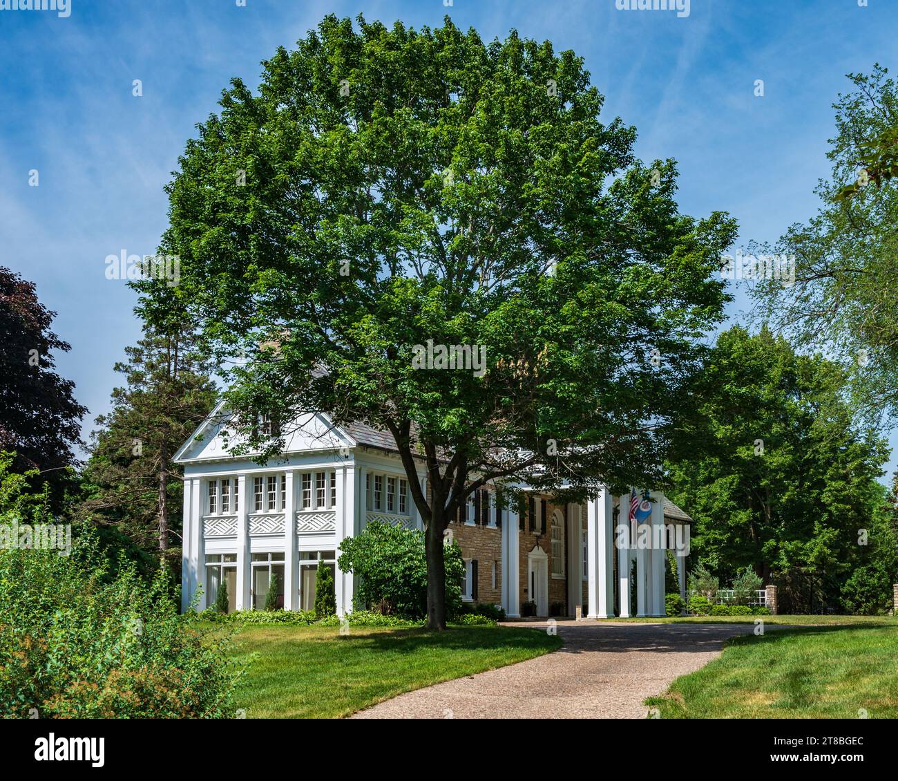 Stately White and Stone House in Rochester, Minnesota in Summer Stock