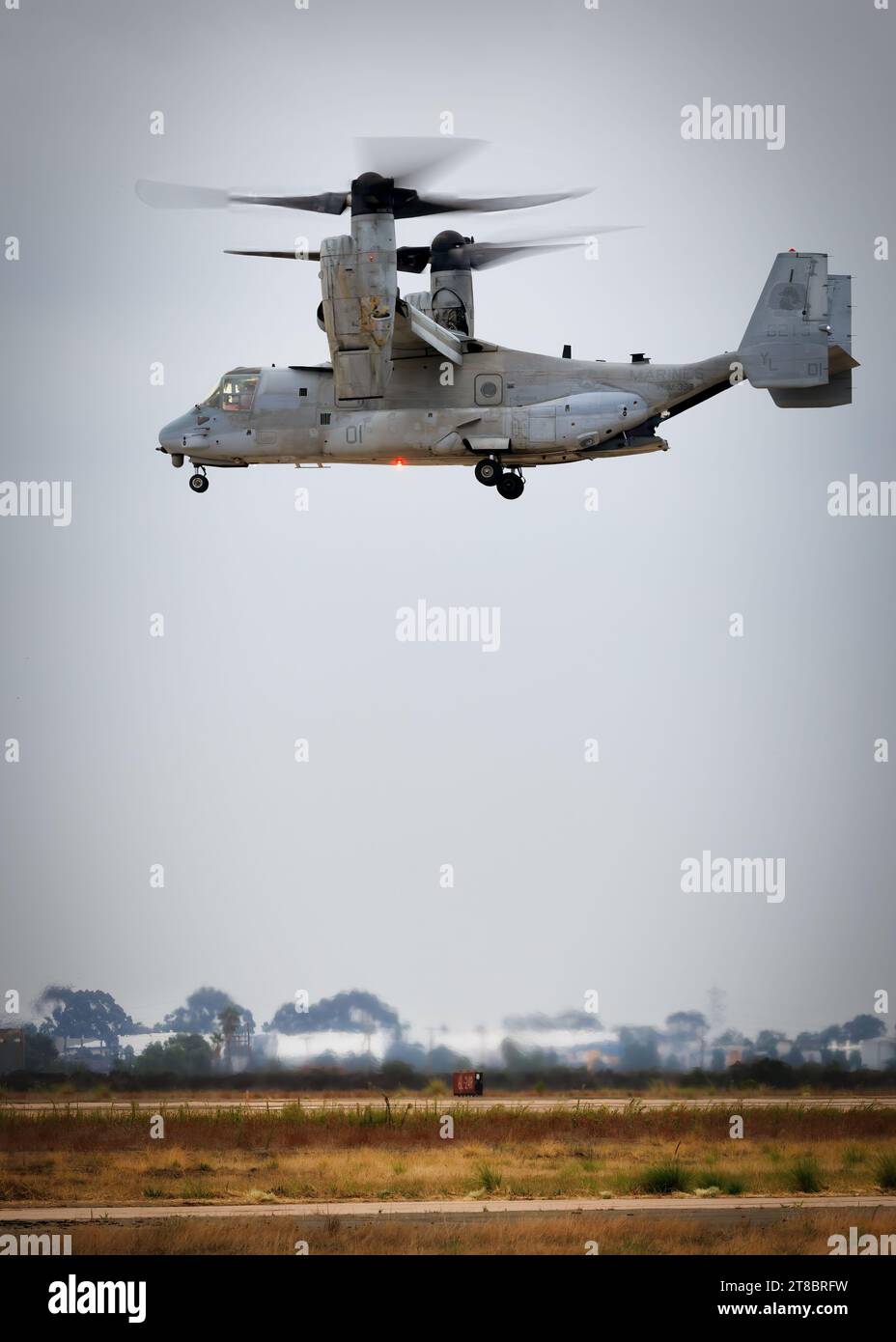 A V-22 Osprey hovers, on a cloudy day, at America's Airshow 2023 in Miramar, California. Stock Photo
