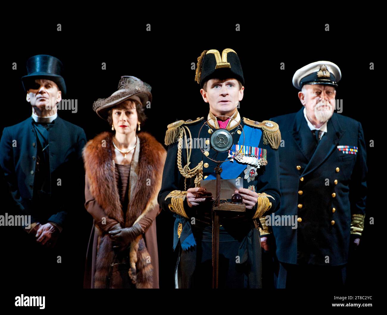 l-r: Michael Feast (Cosmo Lang, Archbishop of Canterbury), Emma Fielding (Queen Elizabeth), Charles Edwards (Bertie, King George VI), Joss Ackland (King George V) in THE KING'S SPEECH by David Seidler at the Yvonne Arnaud Theatre, Guildford, Surrey, England  10/02/2012  design: Anthony Ward  lighting: Mark Henderson  director: Adrian Noble Stock Photo