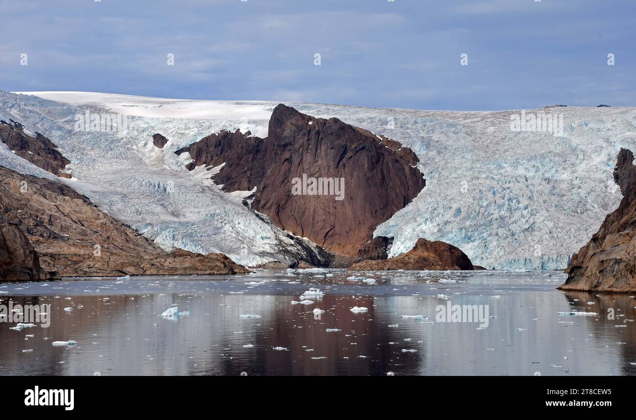 spectacular sermeq kajatleq  glacier in the steep mountains of the prince christian sound, in southern greenland, from a cruise ship Stock Photo