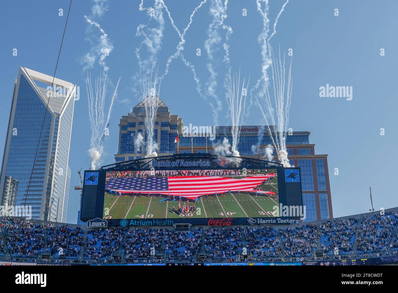 Charlotte, NC USA: A general view of the American flag on the Jumbotron during the National Anthem prior to an NFL game between the Carolina Panthers Stock Photo