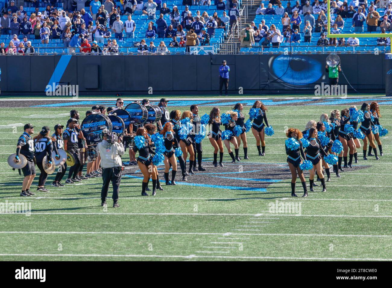 Charlotte, NC USA: Carolina Panthers cheerleaders and the Percussion drum line perform prior to an NFL game against the Dallas Cowboys at Bank of Amer Stock Photo