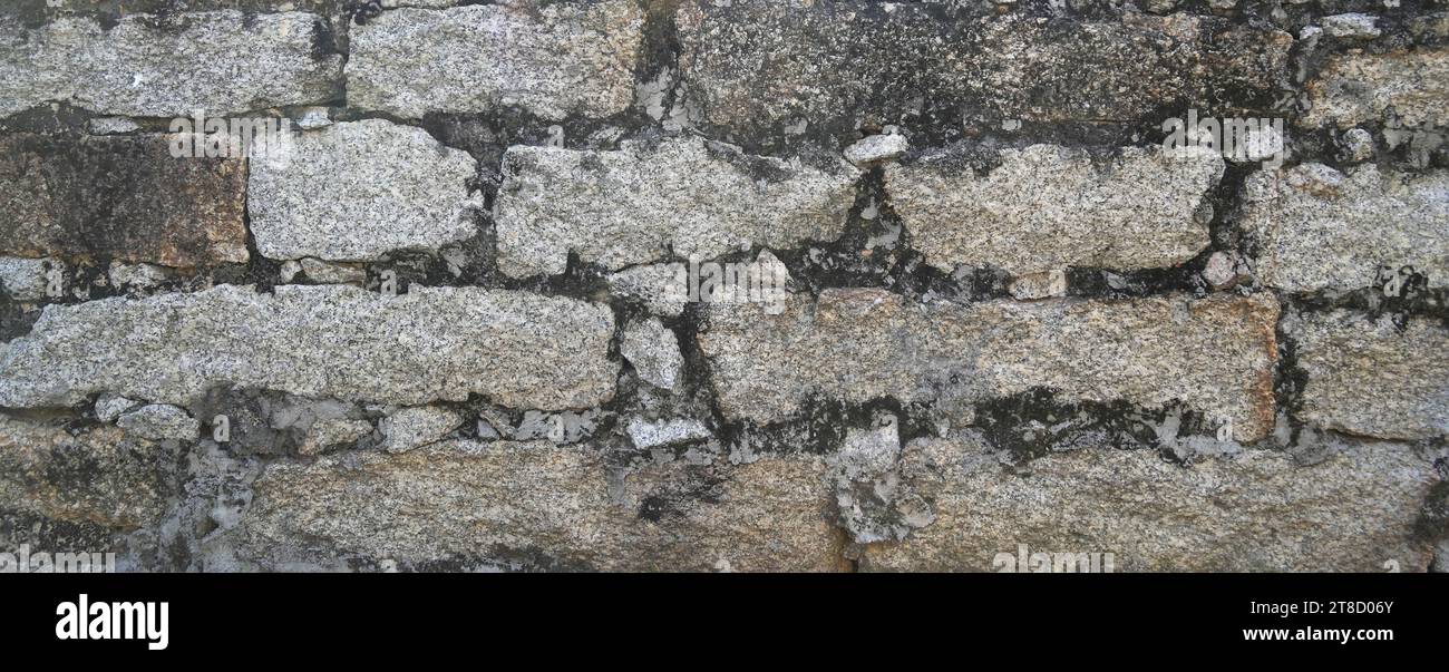 Stone wall texture background of grey brick stones Stock Photo - Alamy