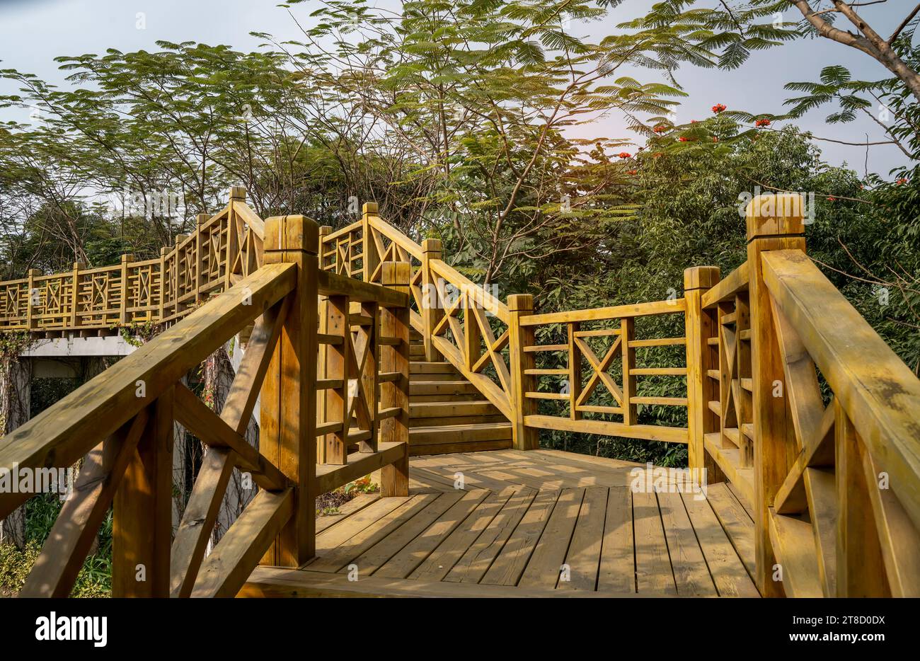 Old wooden bridge in park hi-res stock photography and images - Alamy