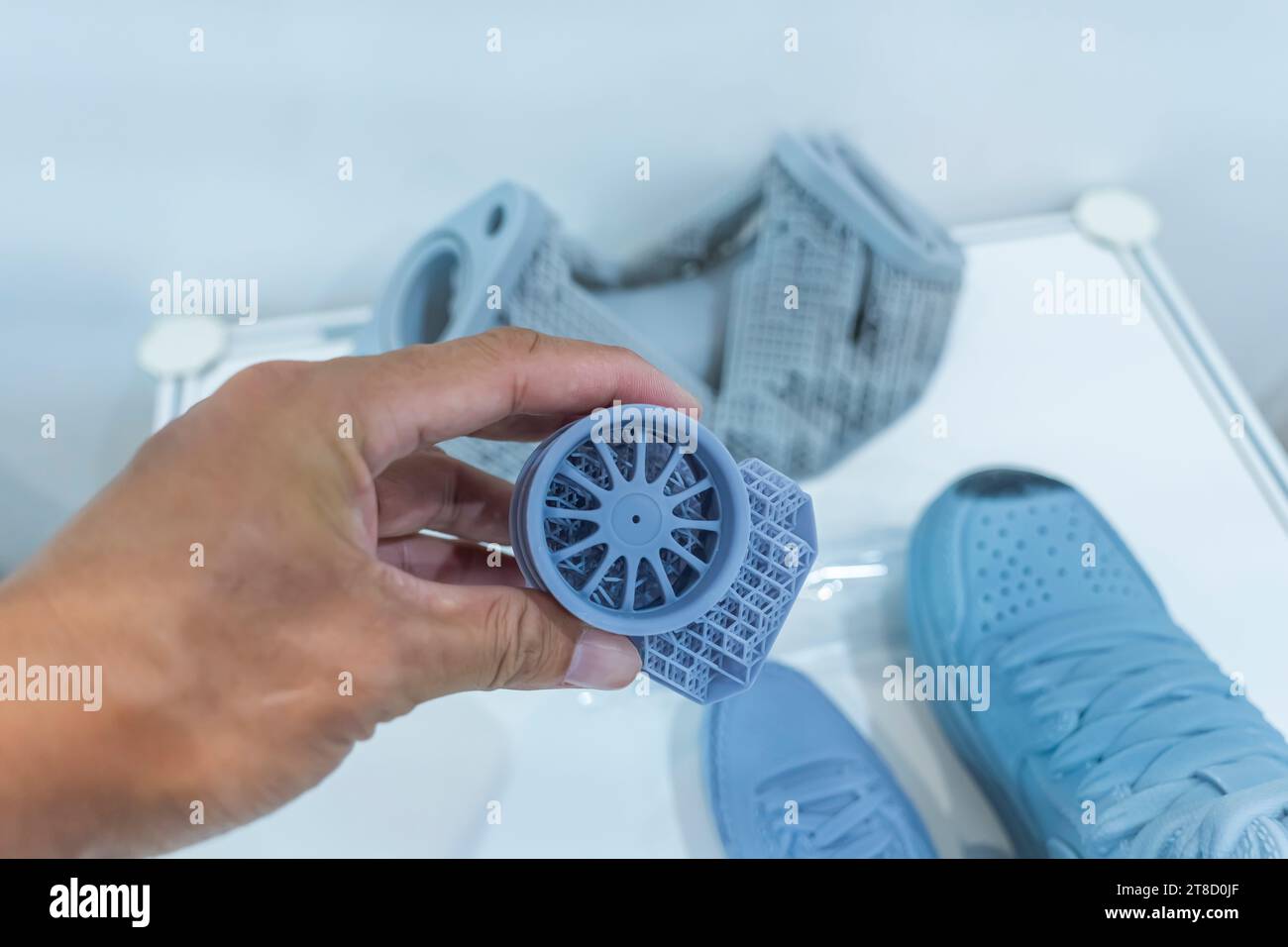 hand with Object printed on 3d printer close-up Stock Photo