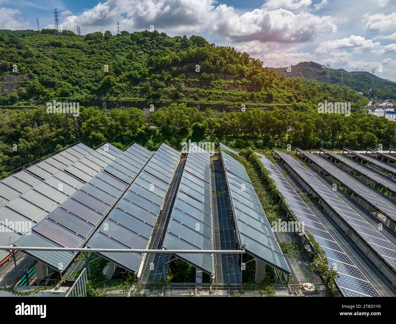 solar or photovoltaic cell in panel on roof top building,Technology to generate electrical power, direct current electricity by light. Green clean ene Stock Photo