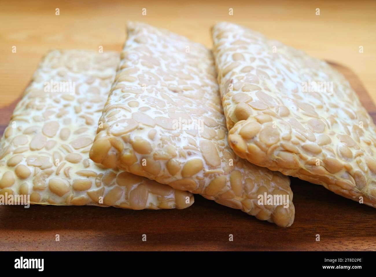 Closeup of heap of Tempeh, made from fermented soybeans, a source of