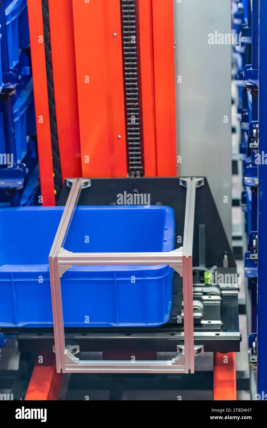 plastic boxes in the cells of the automated warehouse. Metal