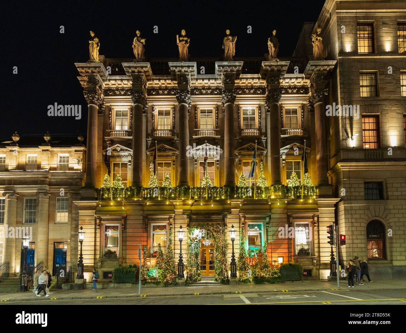 Exterior view at night of the Gleneagles Townhouse private Club, hotel and restaurant in St Andrew Square, Edinburgh, Scotland Stock Photo