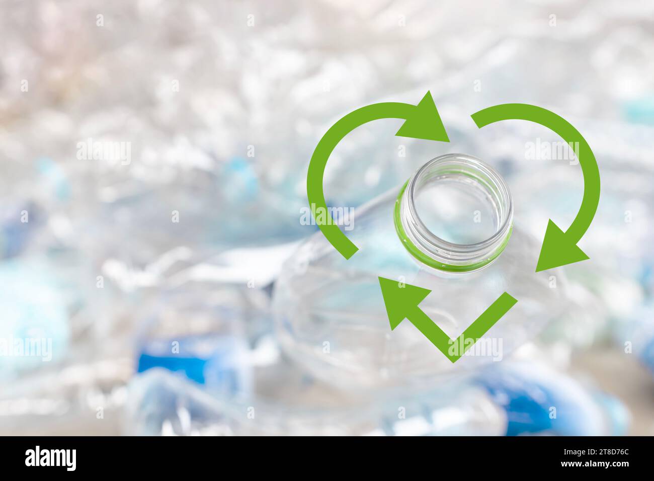 Heart-shaped recycling symbol on Waste water bottles for recycling. Stock Photo