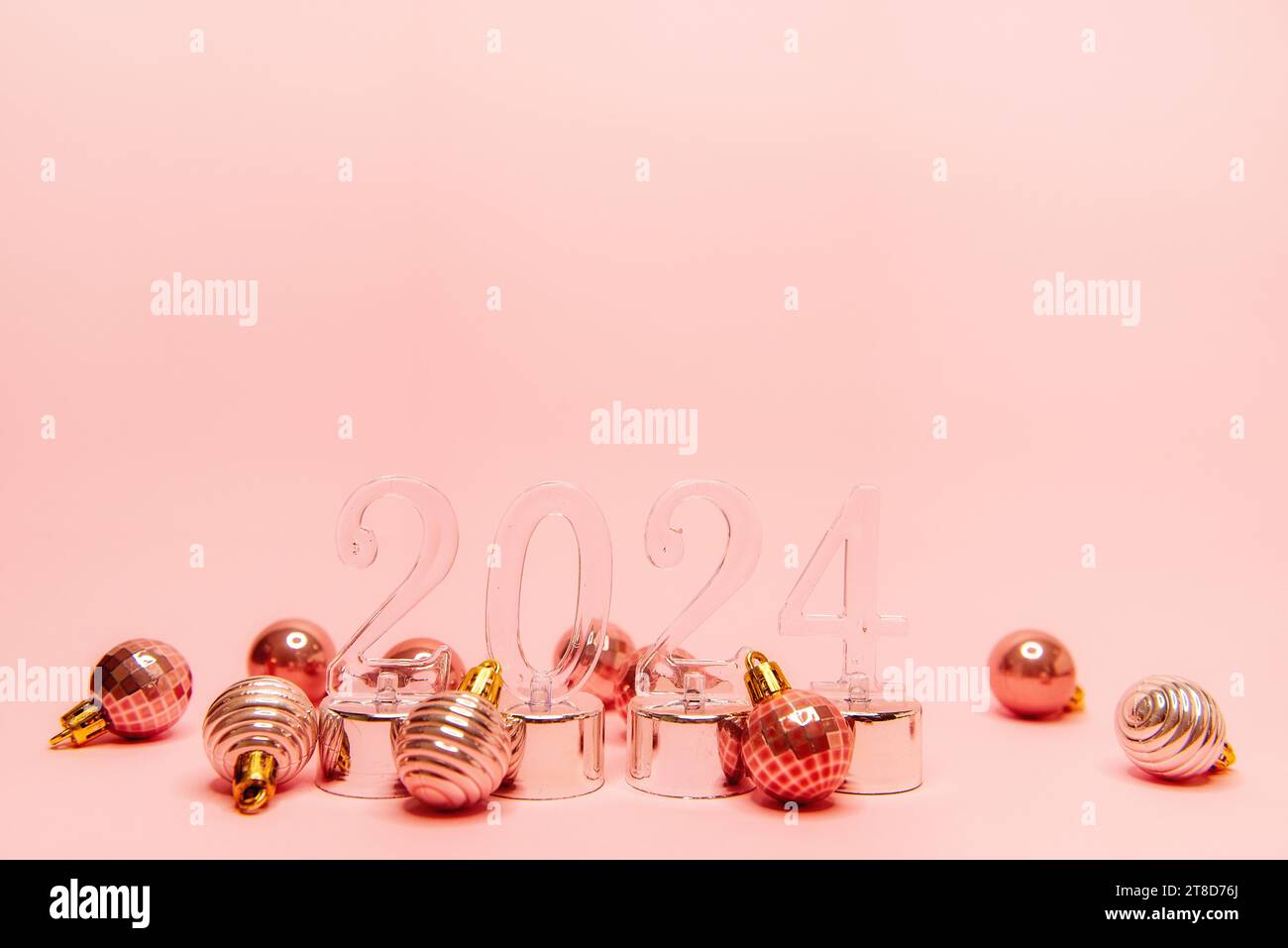 On an isolated soft pink background transparent numbers 2024 with shiny