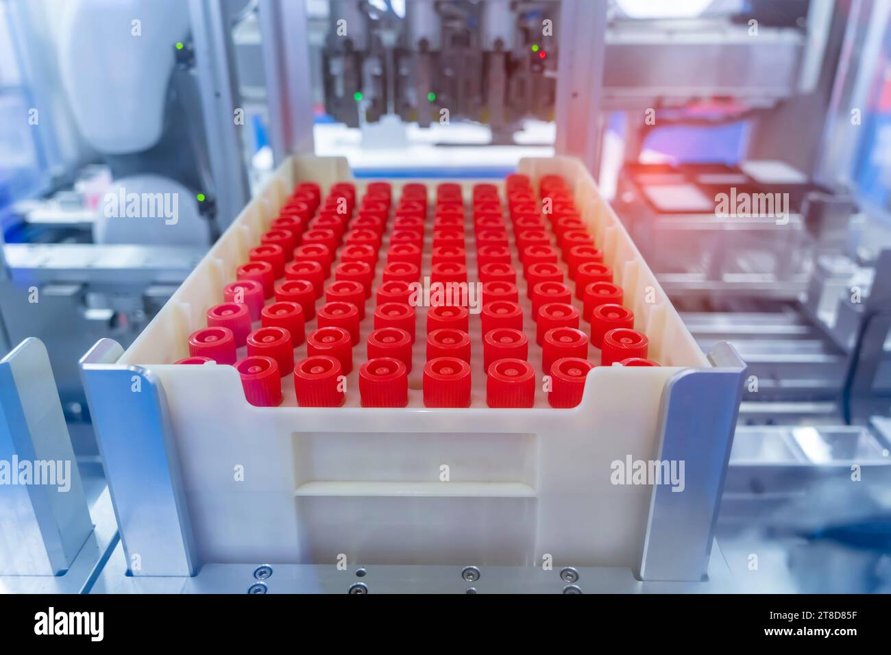 Robot arm with test tube for biological experiments in laboratory Stock