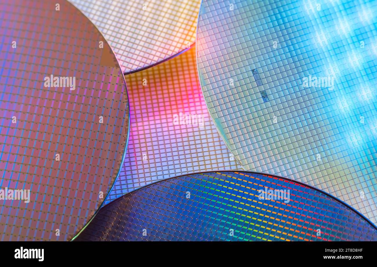 Macro of silicon wafer semiconductor with neon color, integrated ...