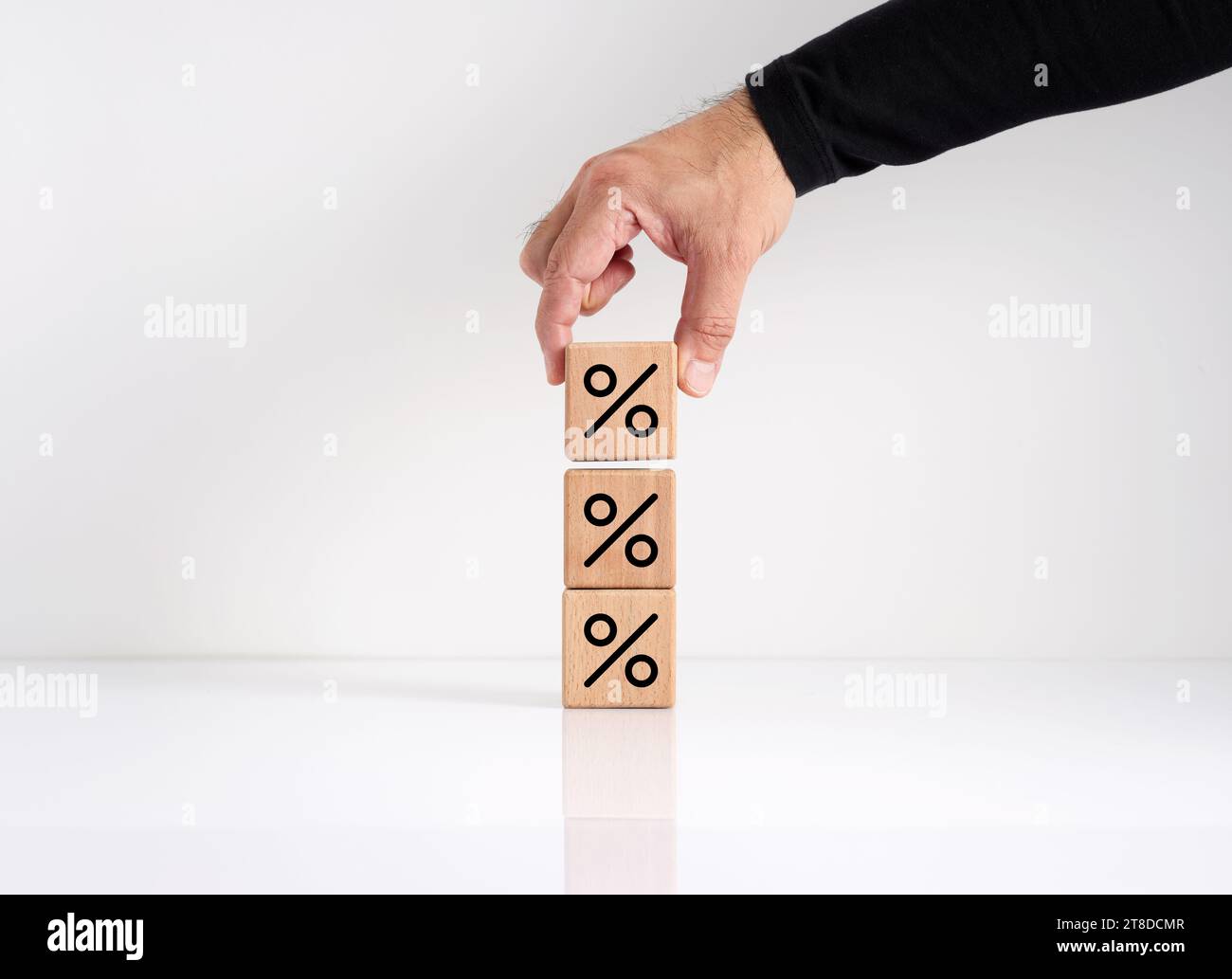 Increasing mortgage or interest rate, profitability or market share. Growing return on stocks and funds. Business and financial growth. Hand stacking Stock Photo