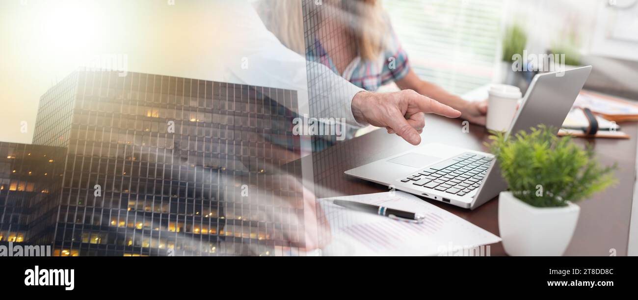 Two business people working together in office; multiple exposure Stock ...