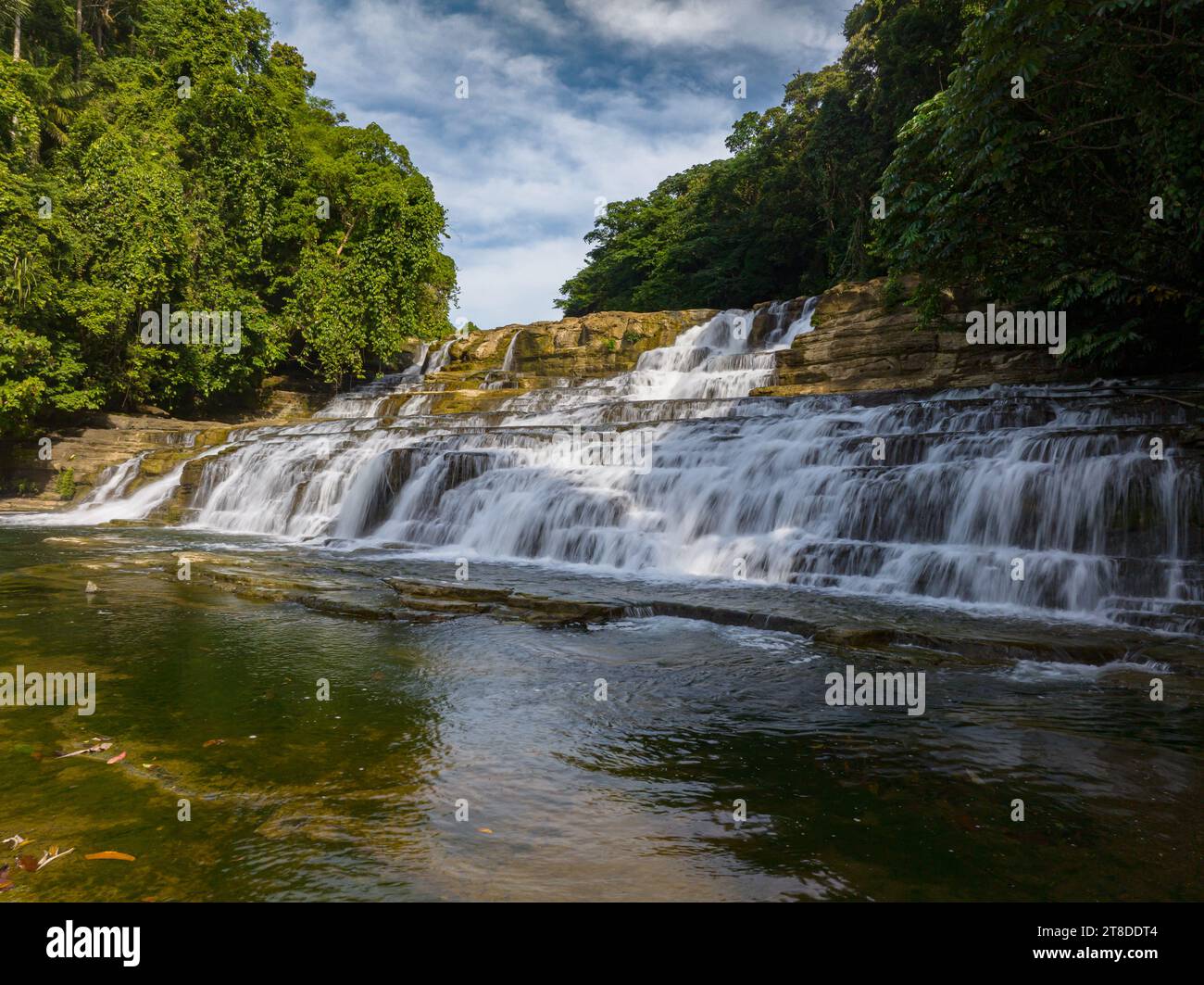 Waterfalls with beautiful water stream. Tinuy-an Falls in Bislig, Surigao del Sur. Philippines. Stock Photo