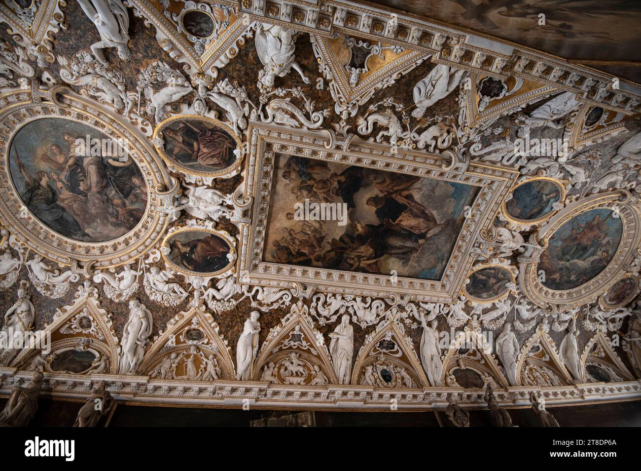 The highly decorated ceiling designed by architect Andrea Palladio with stuccoes and frescoes in the Sala delle Quattro Porte (Hall of the Four Doors) at Stock Photo