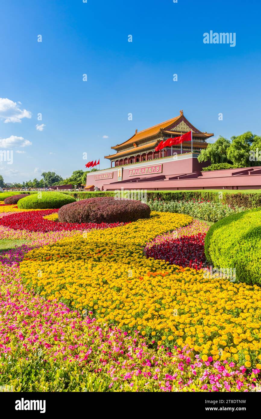Colorful flowers in front of the entrance to the Forbidden City in Beijing, China Stock Photo