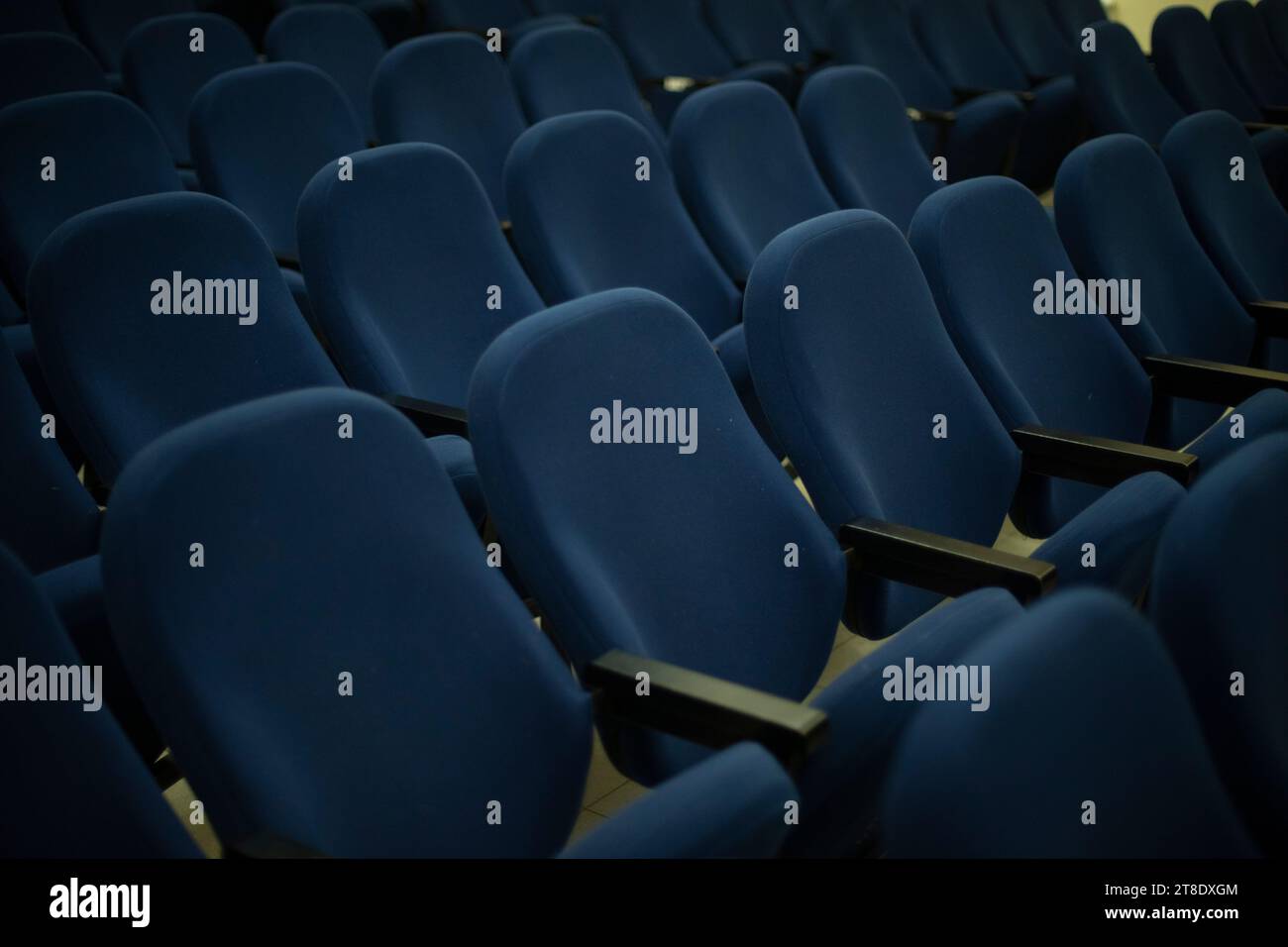 Blue seats in hall. Rows of seats. Cinema Details. Stock Photo