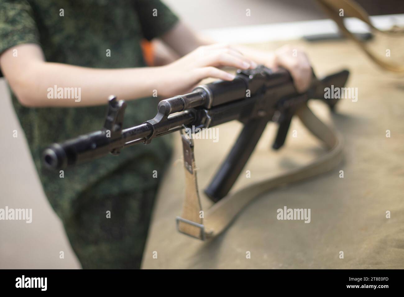 Military training. Assembly of automatic weapons. Stock Photo
