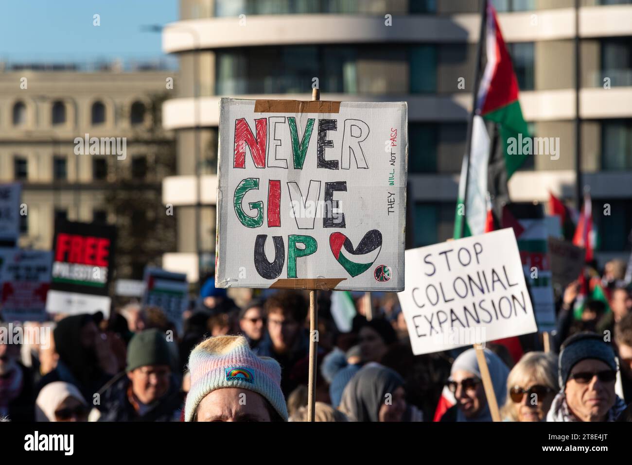 Pro Palestine rally, National Demonstration for Palestine taking place on Armistice Day in London, UK, crossing Vauxhall Bridge. Never give up Stock Photo