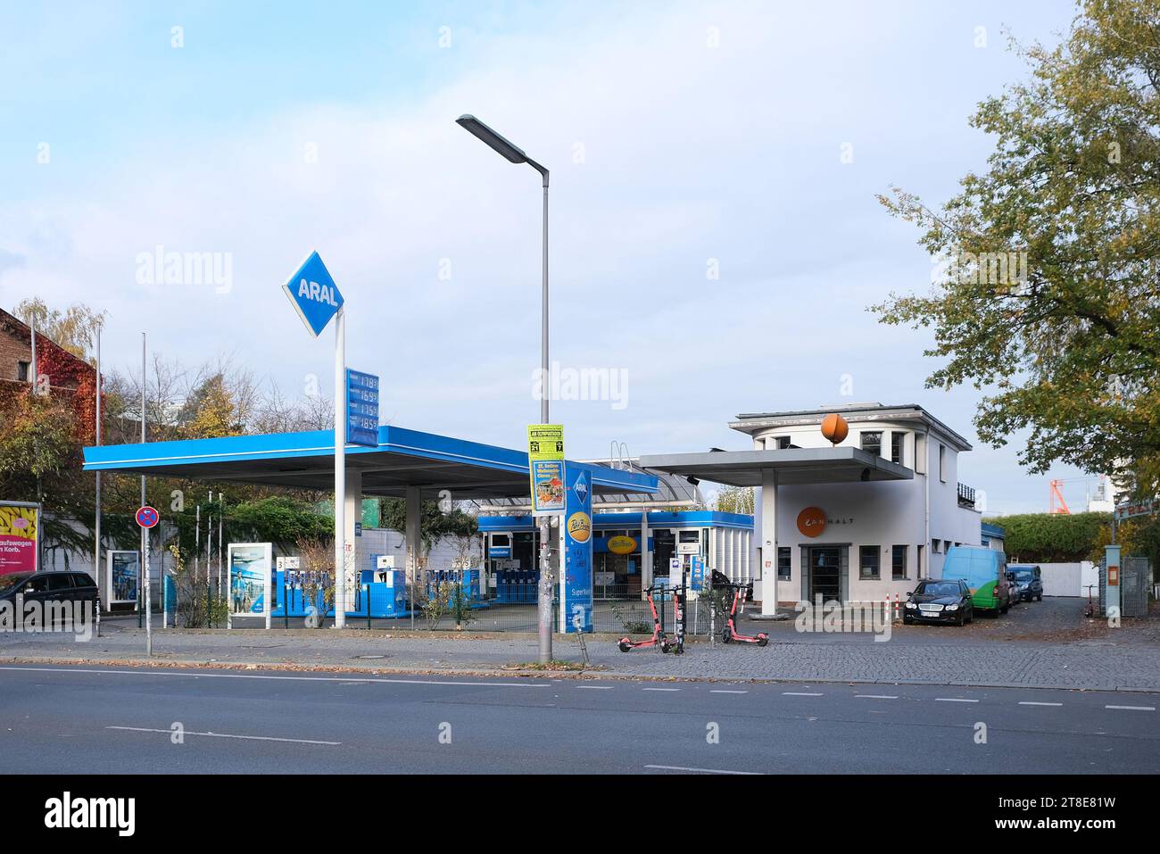 Berlin, Germany, November 11, 2023 Aral petrol station in front of Schlesichen Tor with the listed building of Berlin's first petrol station Stock Photo