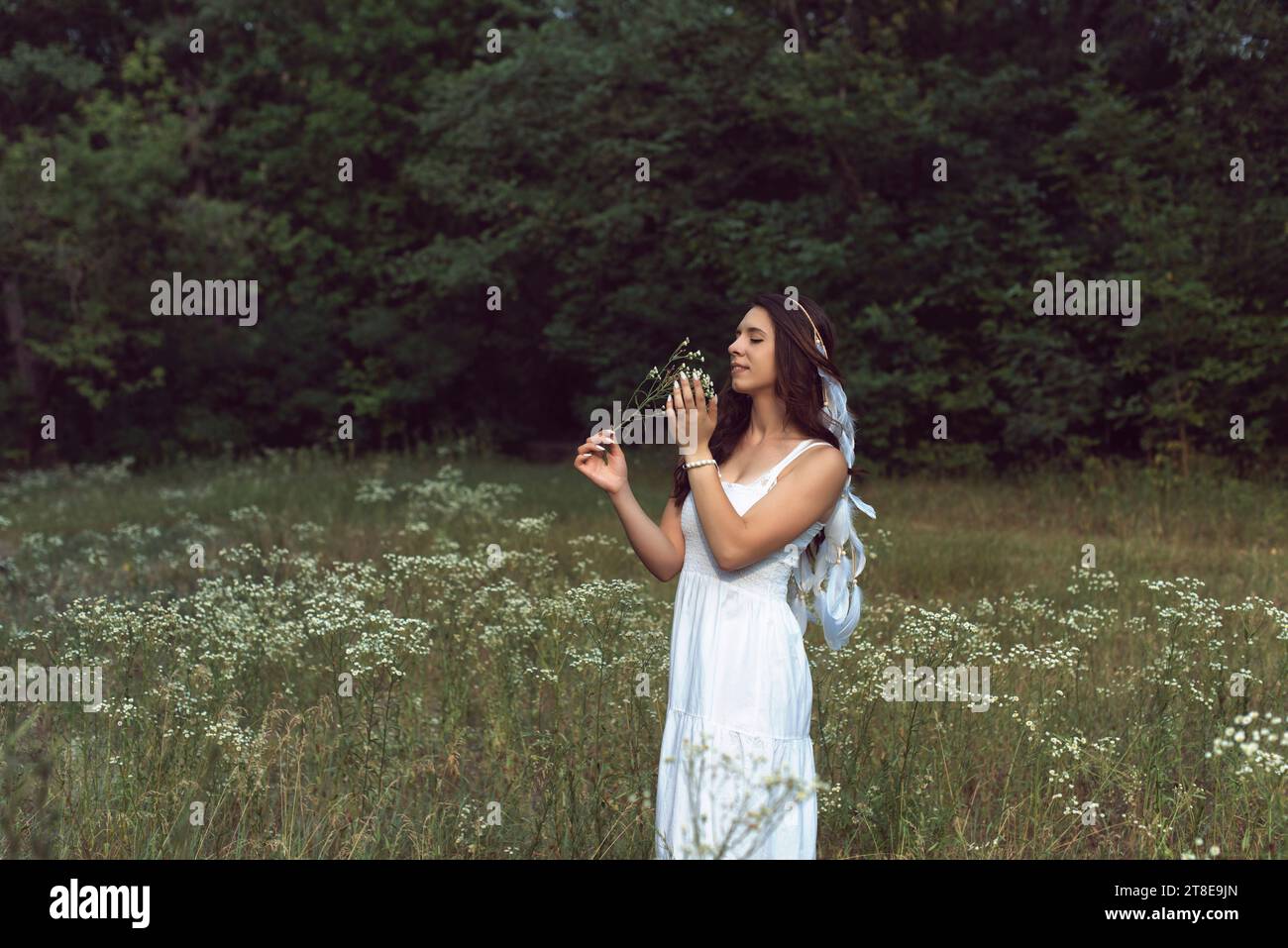 A walk in the park with a young woman Stock Photo - Alamy
