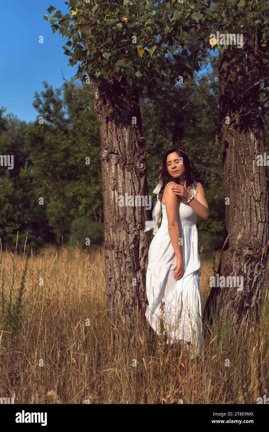 A walk in the park with a young woman Stock Photo - Alamy