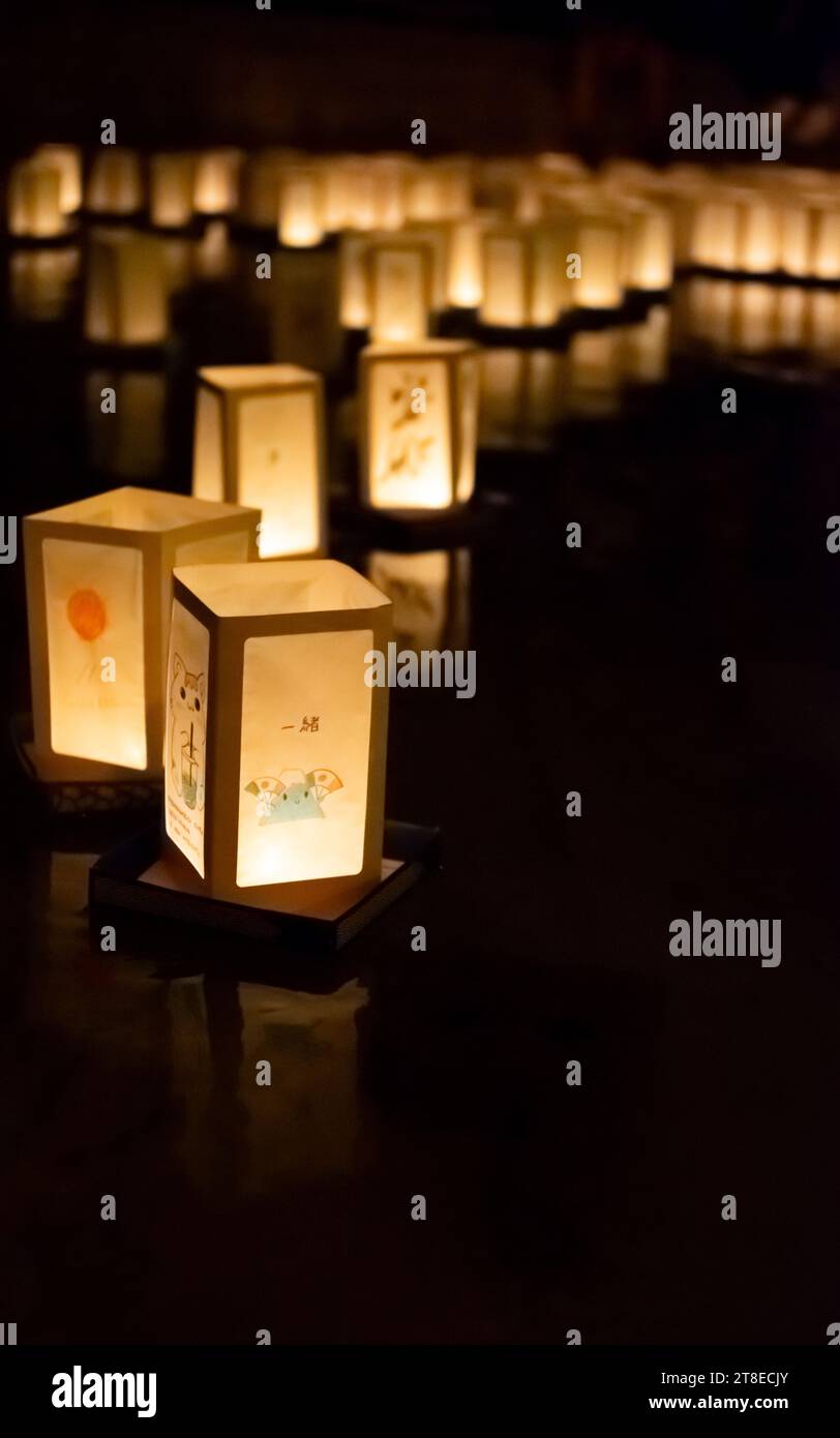 Japanese commemoration of atomic bombs with paper lanterns floating on water Stock Photo Alamy