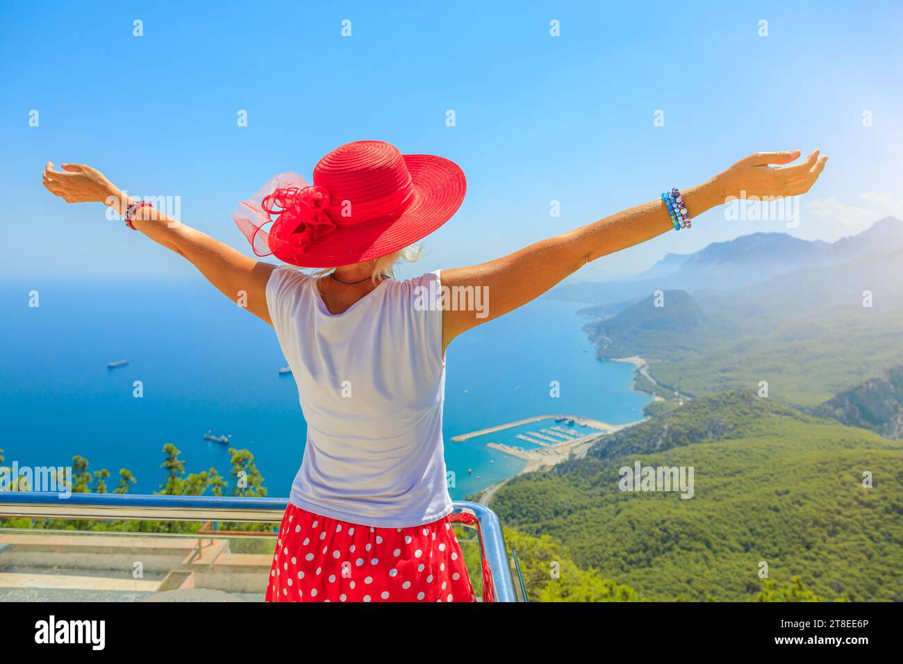 girl at Antalya panorama. Antalya is famous for its stunning beaches and pristine coastline. Turkey Coast lives up to its name with crystal-clear Stock Photo