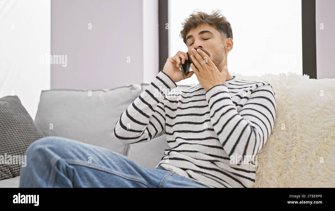 Arab man sitting in sofa hi-res stock photography and images - Alamy