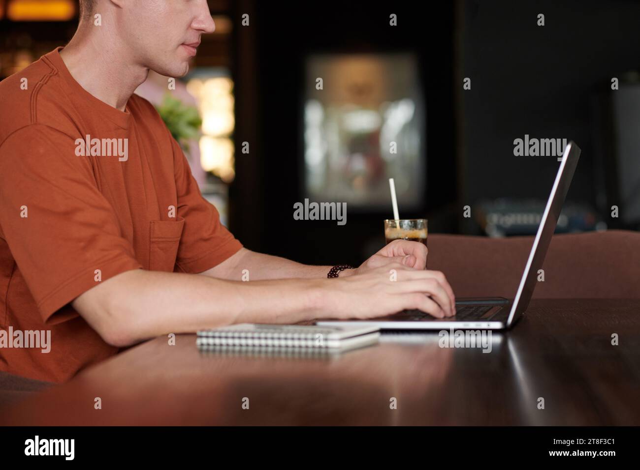 Cropped image of young software developer working on laptop when studying programming Stock Photo