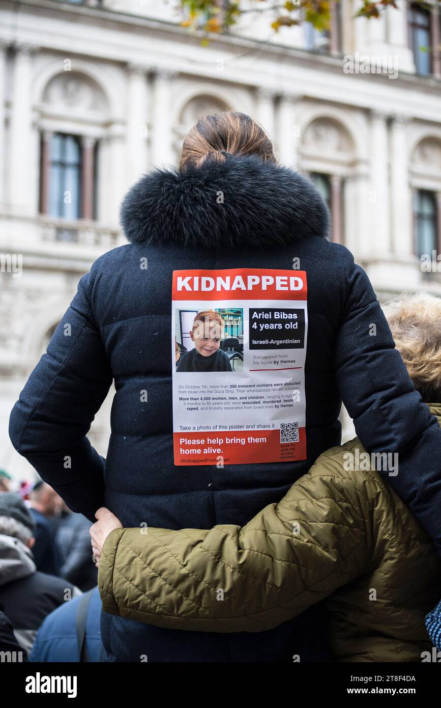 Woman with a Kidnapped poster at the AJEX Annual Parade & Ceremony at the Cenotaph honouring Jewish members of the British Armed Forces, London, UK Stock Photo