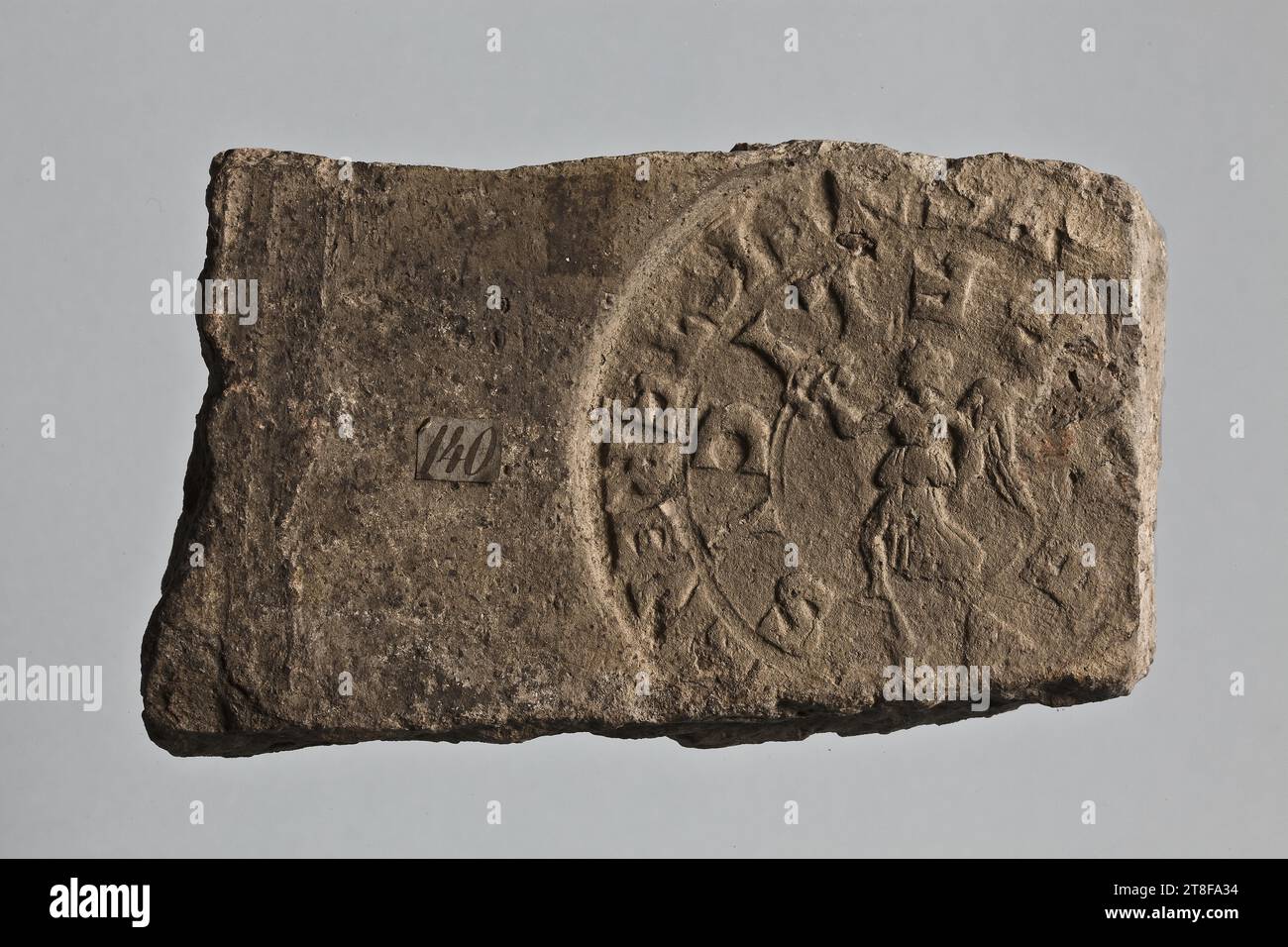 Brick with stamp: (?)AUGNFIGTERENT(?), AE(?)FELICIS, 211 - 217, Brick, Fired, Modelled, Height 8.2 cm, Width 14.3 cm, [ (?)]AUGNFIGTERENT[ (?)], AE[ (?)]FELICIS Stock Photo