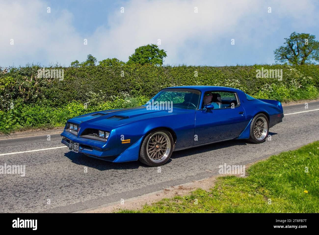 1978 70s seventies American Martinique Blue Pontiac; restored USA classic motors, automobile collectors,  motoring enthusiasts and historic veteran cars travelling in Cheshire, UK Stock Photo