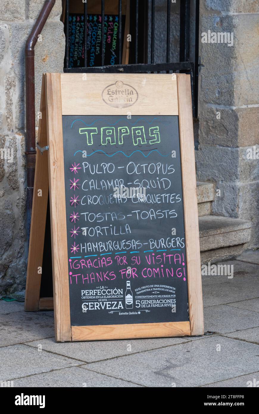 Menu on blackboard advertising Tapas in Port of Vigo, Spain Stock Photo