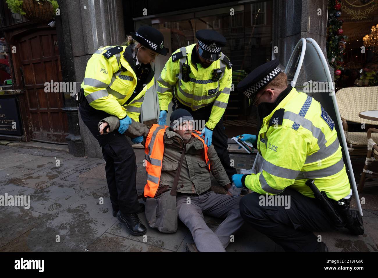 London, UK. 20 November, 2023. Climate activists from Just Stop Oil gather in Trafalgar Square before attempting to slow march down Whitehall demanding an end to new fossil fuel extraction licences amidst a climate emergency. Police rapidly issued a Section 7 notice, arresting those who refused to leave the road under new anti-protest powers in the Public Order Act. Credit: Ron Fassbender/Alamy Live News Stock Photo