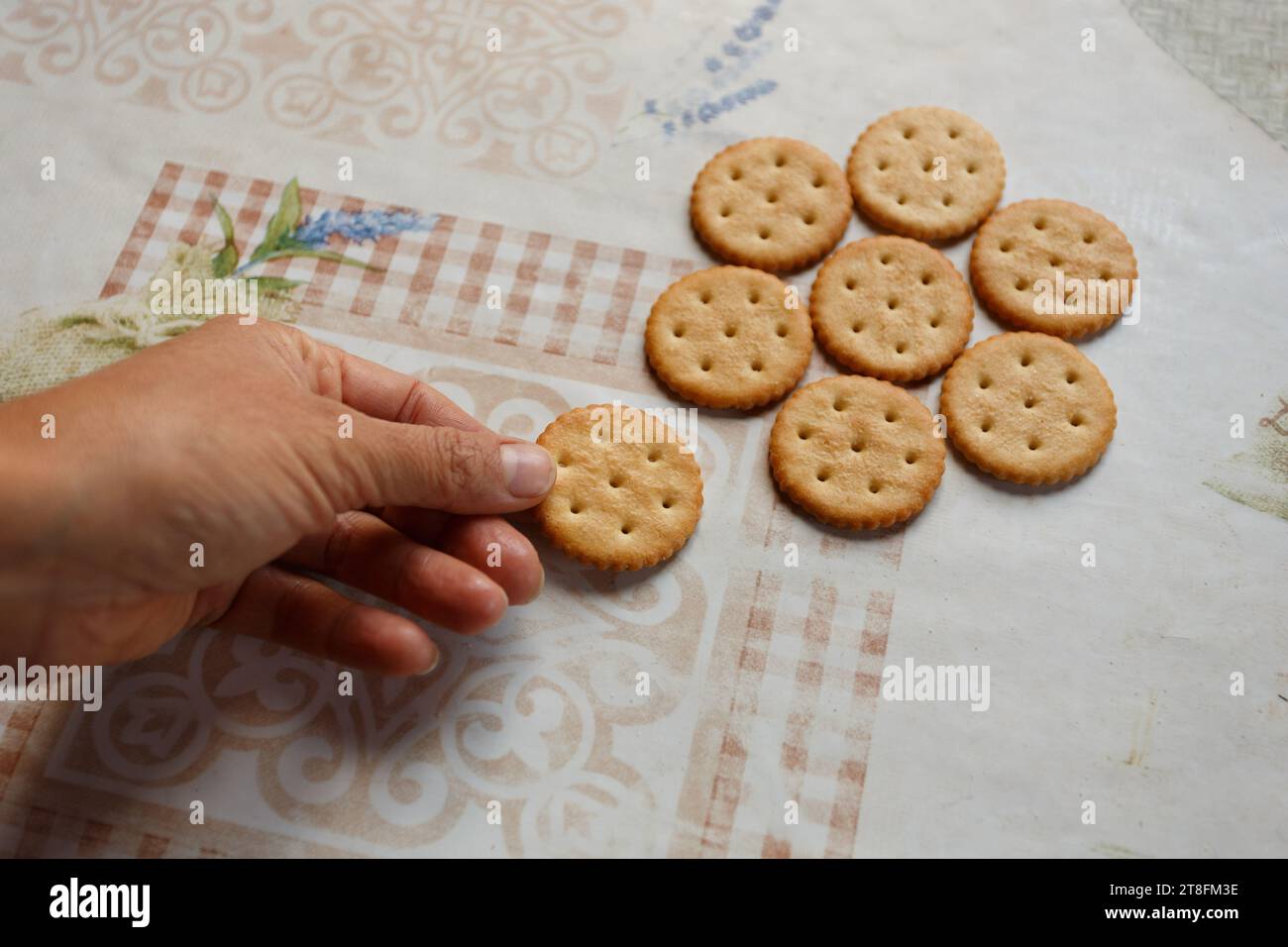 Cookie crackers with salt on the table close Stock Photo