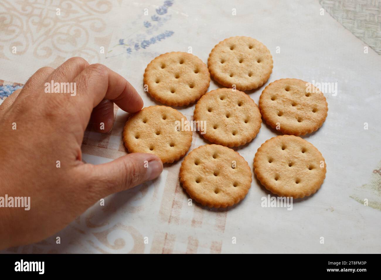Cookie crackers with salt on the table close Stock Photo