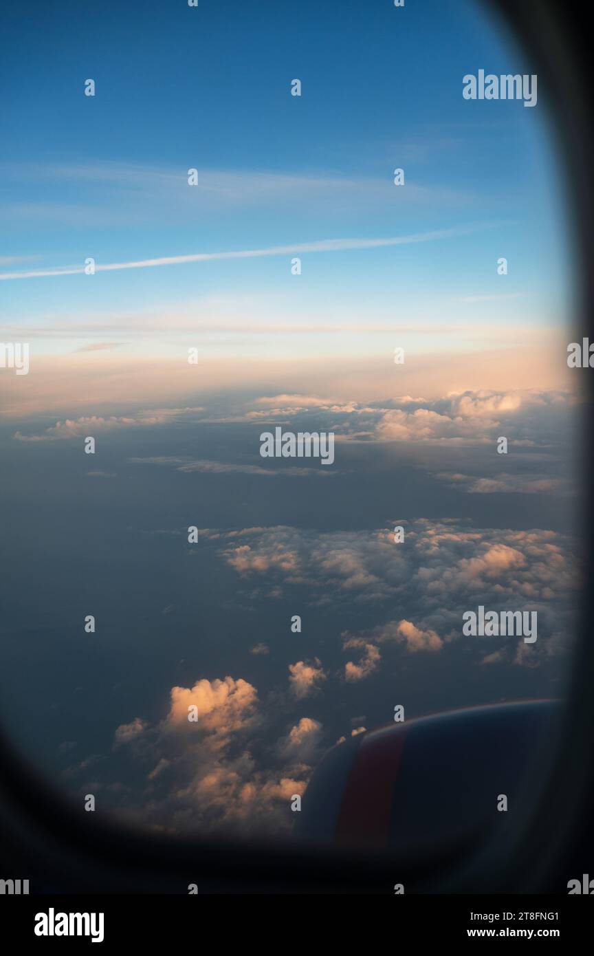 Clouds and sky from airplane window view Stock Photo - Alamy