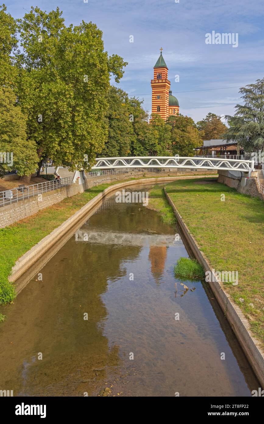 Paracin Paracin, Serbia - October 06, 2023: Pedestrian Bridge Over River Crnica and Church of Holy ...