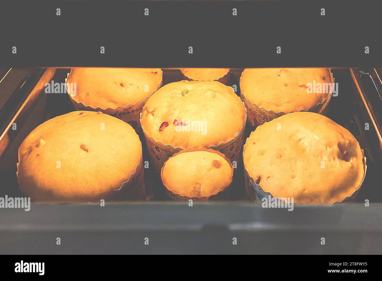 Traditional yeast Easter bread is baked in the oven. Easter cake Stock Photo